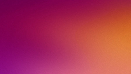 A magenta to orange gradient with a fine grain texture fills the frame. Clear details and vibrant...の写真素材