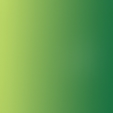 A bright green yellow to dark green gradient texture with a fine dot pattern. Clear details and v...の写真素材