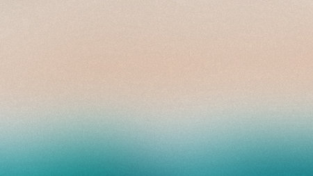 A smooth gradient background transitioning from peach to teal with a fine grain texture.の写真素材