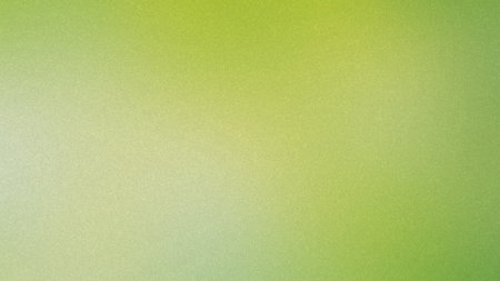 A soft green gradient with a subtle grain texture creates a gentle and airy background.の写真素材