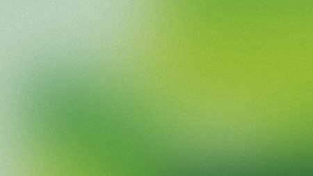 A vibrant green gradient background features a subtle grain texture and soft diffused light.の写真素材