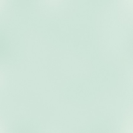 A pale mint green background with a subtle frosted glass texture. Clear details and vibrant color...の写真素材