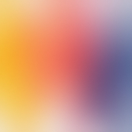 A soft gradient transitioning from yellow and orange to pink and purple with a subtle texture.の写真素材