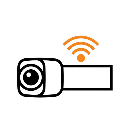 A white camera icon with an orange wifi signal and a black outline on a white background.の写真素材