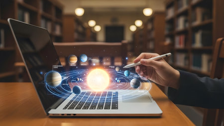 Person using a stylus to interact with a solar system model displayed on a laptop screen.