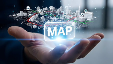 A hand holds a holographic 3D city map with navigation markers and transportation routes.の写真素材