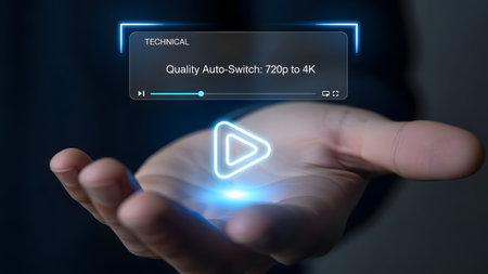 Hand holds glowing play button and video quality interface with 720p to 4k auto-switch Clear deta...の写真素材