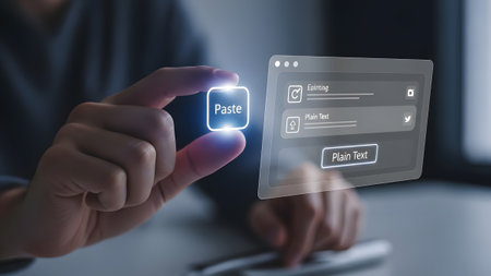 Hand holds a paste button next to text input fields on a transparent screen. Clear details and vi...