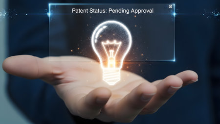 Hand holds patent pending approval lightbulb with digital interface Clear details and vibrant col...