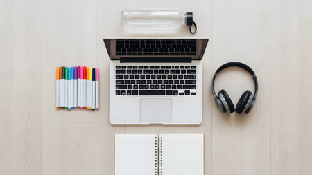 A modern and organized workspace setup with essential tools for creativity and productivityの写真素材