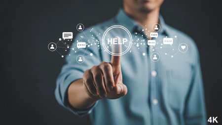 A person in a light blue shirt touches a HELP amidst a network of communication...の写真素材