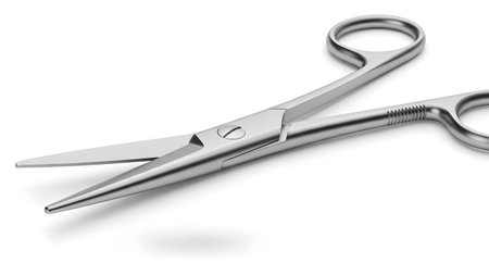 Silver showing close-up of scissors with silver metal handles and pointed blades on...