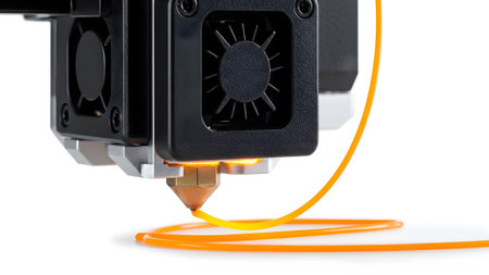 Stock showing 3d printer hot end extruder nozzle melting orange filament with fan on white...