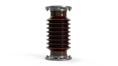 showing brown ceramic electrical insulator with flanged metal ends on white background....