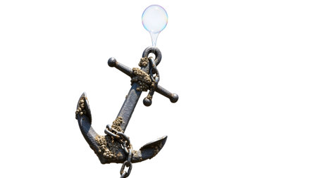 Stock showing old rusty anchor with barnacles and a small bubble on white background.