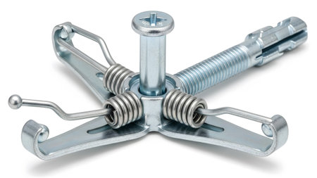 Spring showing spring loaded toggle bolt anchor with screw and metal expansion sleeve.