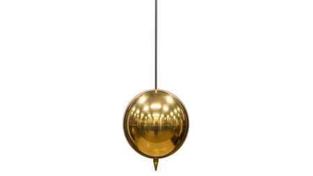 Polished brass sphere pendulum with pointed tip on white background.