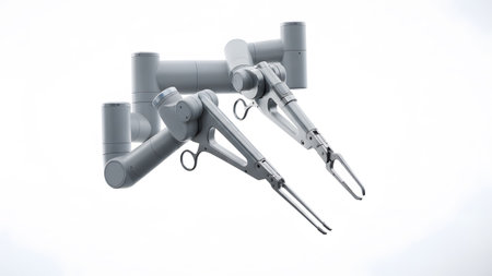 Two robotic surgical arms with different end effectors on a white background...
