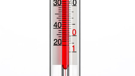 Close up of a glass thermometer with red liquid indicating a temperature below zero degrees...