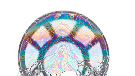 A detailed macro view of a large, iridescent soap bubble displaying vibrant rainbow colors and...
