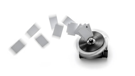 Motion showing spinning cd disc ejecting blank white cards with motion blur on white background....