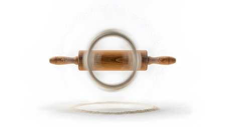 Wooden showing wooden rolling pin with flour dust and motion blur effect on white background....の写真素材