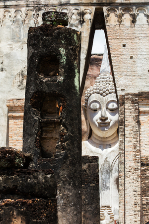 SUKHOTHAI THAILAND  The Main Buddha with golden hand in the temple of Sukhothai historical park in Sukhothai, Thailandの写真素材