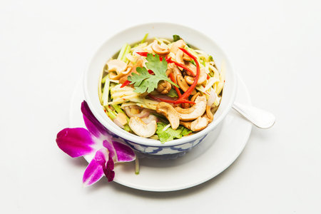 Thai spicy mango salad with spicy sauce