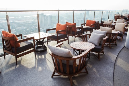 Chairs on the scenic view of the city.の写真素材