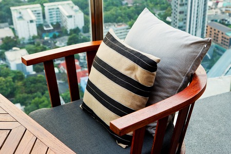 Wooden sofa in the lounge a garden setting.の写真素材