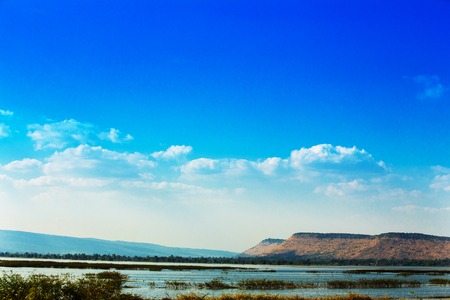 Trees mountains and sky viewsの写真素材