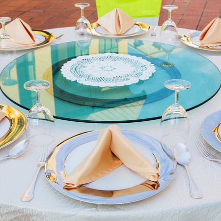 Empty glasses set in restaurantの写真素材