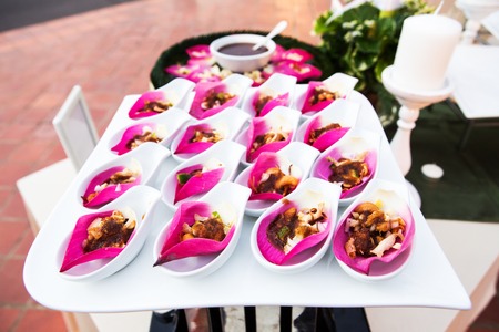 Mix fried rice contained in lotus flower leafの写真素材