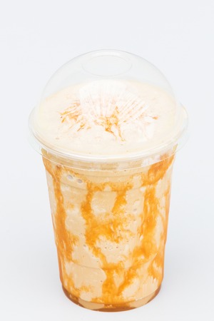Coffe cocktail with caramel in glass cupの写真素材