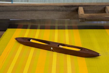 Detail of weaving loom for homemade silk or textile productionの写真素材