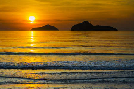 Natural scene at Ao Manow beach in sunrise time. Process color.の写真素材