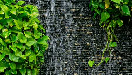 Picture Of Water Flowing Down A Man-made Waterfall.の写真素材