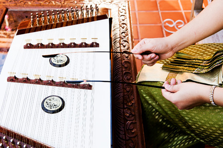 hand play dulcimer, music instrument,Thai wooden dulcimer musical instrumentの写真素材