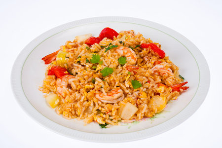 Fried rice with shrimp on white plateの写真素材