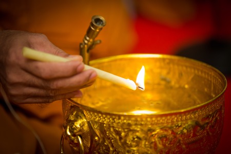 holy water, the monks and religious rituals in thai ceremonyの写真素材