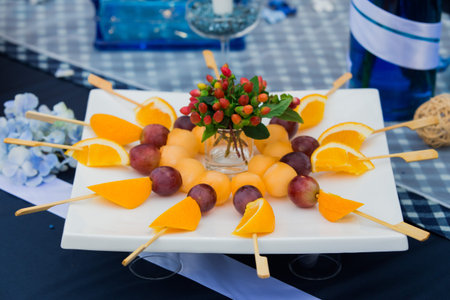 fruit and egg yoke fudge balls cooked in syrup in partyの写真素材