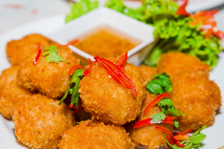Thai Food Fried Shrimp Cake (Tod Mun Kung) on white plateの写真素材