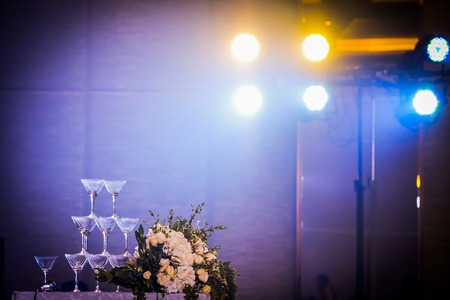Champagne tower with spot light in backgroundの写真素材
