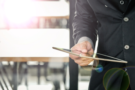 Business man working with a digital tabletの写真素材