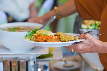 people group catering buffet food indoor in luxury restaurant with meat colorful fruits and...