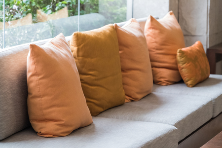 modern sofa in modern living room with pillowsの写真素材