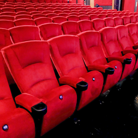 Empty red chair in the cinema  seats.の写真素材