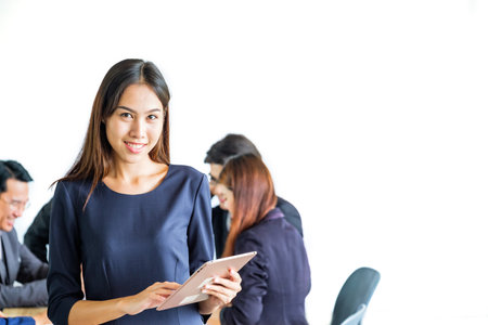 Portrait Of Multiracial Businesspeople Brainstorming In Meeting