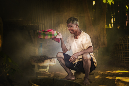 Thai man  with the way of life in the morning.の写真素材