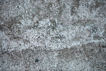 White old cement wall concrete backgrounds textured. Abstract vintage texture. Background from cracks, breaks, stains. Grunge cracks, damageの写真素材